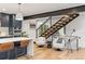 Open-concept kitchen and living area with modern finishes and seamless flow, perfect for modern living at 4590 Wolff St, Denver, CO 80212