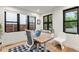 Inviting office with built-in desk space, great natural light, and sleek furnishings for a productive work environment at 4590 Wolff St, Denver, CO 80212