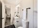 Charming bathroom with a classic vanity, an illuminated mirror, and elegant finishes, blending style and functionality at 3082 S Florence Ct, Denver, CO 80231