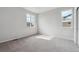 Bright bedroom with large windows and plush carpeting at 1341 Loraine N Cir, Lafayette, CO 80026