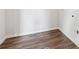 Empty laundry room with wood-look floors and hookups for washer and dryer at 1341 Loraine N Cir, Lafayette, CO 80026