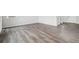 Spacious living area featuring hard surface flooring and a seamless transition to the staircase at 1341 Loraine N Cir, Lafayette, CO 80026