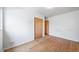 Bright bedroom with hardwood floors and a closet, providing ample space at 2571 S Birch St, Denver, CO 80222
