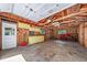 Spacious garage with cabinets, shelves, and ample storage, offering organization at 2571 S Birch St, Denver, CO 80222