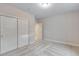 This neutral bedroom has a spacious closet and soft gray carpet at 1443 Great Western Dr, Longmont, CO 80501