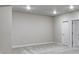 Empty bedroom featuring neutral walls, plush carpeting, and a closet with sliding doors at 1443 Great Western Dr, Longmont, CO 80501