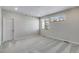 Serene bedroom boasts plush carpeting, natural light, and closet at 1443 Great Western Dr, Longmont, CO 80501