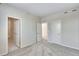 Bright bedroom featuring access to the bathroom and closet at 1443 Great Western Dr, Longmont, CO 80501