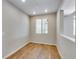 Cozy office space with natural light, wood floors, and neutral wall paint at 1443 Great Western Dr, Longmont, CO 80501
