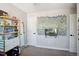 Bedroom with personal touches including a decorative wall and stylish shelving unit at 4080 Adams St, Denver, CO 80216