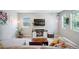 Cozy living room with natural light, stylish furniture, and decorative accents at 4080 Adams St, Denver, CO 80216