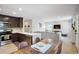Spacious living area showcases kitchen, dining table, and modern decor at 4080 Adams St, Denver, CO 80216