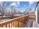 Wooden balcony overlooking the neighborhood, with wood railings and privacy at 474 S Gaylord St, Denver, CO 80209