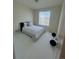 Cozy bedroom with neutral tones, a comfortable bed, and a sunny window, perfect for rest and relaxation at 8163 S Valleyhead Way, Aurora, CO 80016