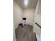 Mud room has tiled floor, storage cabinet and closet for storing shoes and outerwear at 8163 S Valleyhead Way, Aurora, CO 80016
