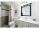 Bathroom with shower, toilet, and vanity at 9485 Joyce Ln, Highlands Ranch, CO 80126