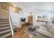 Bright living room with hardwood floors and comfortable seating at 9485 Joyce Ln, Highlands Ranch, CO 80126