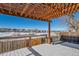 Covered patio with hot tub and mountain views at 9485 Joyce Ln, Highlands Ranch, CO 80126