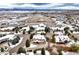 Aerial view of house and neighborhood, snow-covered at 1365 Gentry Pl, Castle Rock, CO 80104