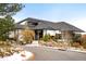 Exterior of a clubhouse with snow on the ground at 1365 Gentry Pl, Castle Rock, CO 80104