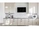 Kitchen with granite countertops and neutral cabinets at 1365 Gentry Pl, Castle Rock, CO 80104