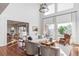 Bright living room with hardwood floors, high ceilings, and views at 1365 Gentry Pl, Castle Rock, CO 80104