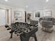 Finished basement boasts ample space for entertainment, featuring stylish decor, modern lighting, and durable flooring at 15498 E Dorado Pl, Centennial, CO 80015