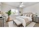 Bedroom with a large bed, neutral decor, and great natural light at 15498 E Dorado Pl, Centennial, CO 80015