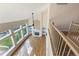 Bright living room with tall ceilings, lots of windows, fireplace, and wood floors at 15498 E Dorado Pl, Centennial, CO 80015