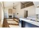 Open-concept living room featuring a fireplace, hardwood floors, and natural light at 15498 E Dorado Pl, Centennial, CO 80015
