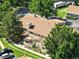 Beautiful aerial view of a home showcasing well-maintained lawns, trees, and a serene neighborhood setting at 8422 Everett Way # C, Arvada, CO 80005