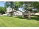 Beautiful Timber Cove home with a well-maintained lawn and mature trees, perfect for outdoor enjoyment at 8422 Everett Way # C, Arvada, CO 80005