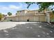 Convenient parking with multiple garages, offering ample space for vehicles and storage at 8422 Everett Way # C, Arvada, CO 80005
