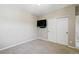 Carpeted bedroom featuring a large closet with sliding doors and modern ceiling lighting at 31112 Black Eagle Dr # 103, Evergreen, CO 80439