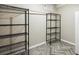 Walk-in closet featuring wood look flooring and wire shelving for storage at 31112 Black Eagle Dr # 103, Evergreen, CO 80439