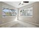 Bright bedroom with large windows offering views and natural light at 31112 Black Eagle Dr # 103, Evergreen, CO 80439