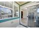 Inviting patio area with sliding door access to the interior at 31112 Black Eagle Dr # 103, Evergreen, CO 80439