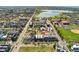Stunning aerial view of the property and its surrounding neighborhood near a lake at 3414 W 18Th Ave, Denver, CO 80204