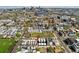 Sweeping aerial view of the property and the city skyline in the distance at 3414 W 18Th Ave, Denver, CO 80204