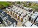 Aerial view of modern townhome community featuring rooftop decks and contemporary design at 3414 W 18Th Ave, Denver, CO 80204