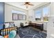 Cozy bedroom with large windows, stuffed animals and natural light at 3414 W 18Th Ave, Denver, CO 80204