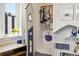 Bright bedroom nook with custom closet and unique decorations, with a large window letting in plenty of light at 3414 W 18Th Ave, Denver, CO 80204