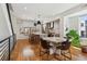 Open concept kitchen with hardwood floors, a large island, and modern decor at 3414 W 18Th Ave, Denver, CO 80204