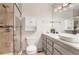 Modern bathroom featuring a glass-enclosed shower, stylish vanity, and neutral tones for a spa-like experience at 3798 E 118Th Way, Thornton, CO 80233