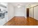 Open dining area with hardwood floors at 3184 S Heather Gardens Way # 403, Aurora, CO 80014
