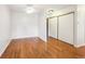 Simple dining room with hardwood floors at 3184 S Heather Gardens Way # 403, Aurora, CO 80014