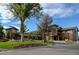Modern two-story building with landscaping and parking at 3184 S Heather Gardens Way # 403, Aurora, CO 80014
