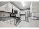 Modern kitchen with stainless steel appliances at 3184 S Heather Gardens Way # 403, Aurora, CO 80014