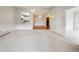 Living room with carpet and access to other rooms at 3184 S Heather Gardens Way # 403, Aurora, CO 80014