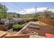 Landscaped backyard featuring raised garden beds with mountain views at 420 Sunshine Pkwy, Golden, CO 80403